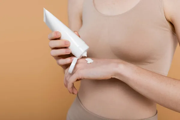 Cropped View Woman Applying Cream Hand Isolated Beige — Stock Photo, Image