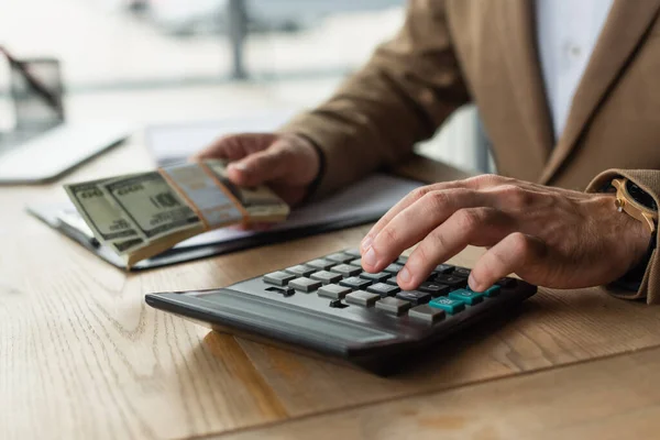 Cropped View Accountant Using Calcuator While Holding Dollar Banknotes Corruption — Stock Photo, Image