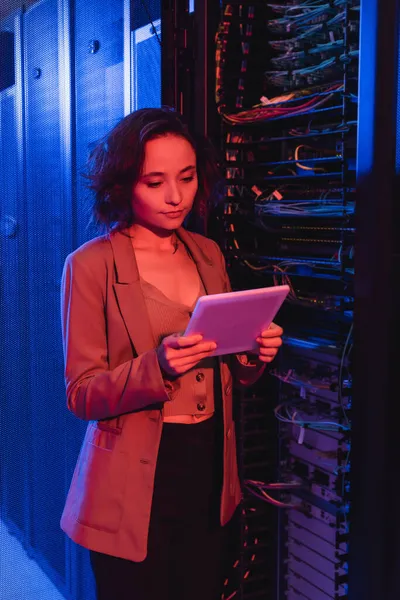 Young Programmer Looking Digital Tablet While Standing Server Data Center — Stock Photo, Image