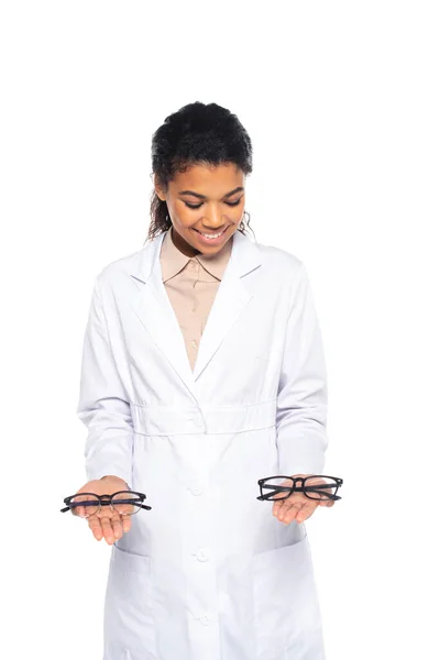 Happy African American Oculist White Coat Holding Eyeglass Isolated White — Stok Foto