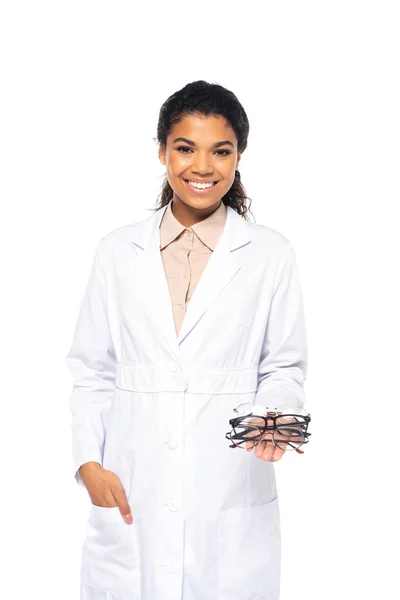 Young African American Ophthalmologist Holding Eyeglasses Looking Camera Isolated White — Stock Photo, Image
