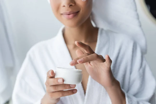 Cropped View African American Woman Bathrobe Holding Container Face Cream — Stock Photo, Image