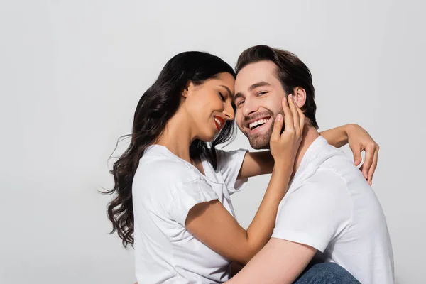 Cheerful Man Looking Camera Sexy Brunette Woman Hugging His Face — Stock Photo, Image