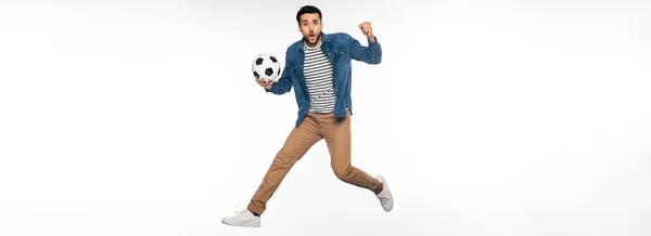 Homem Preocupado Levitar Enquanto Segurando Bola Futebol Torcendo Branco Banner — Fotografia de Stock