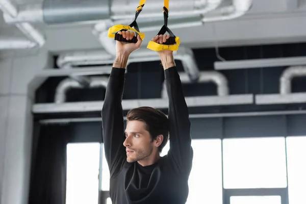 Sportsman Working Out Suspension Straps Sports Center — Stock Photo, Image