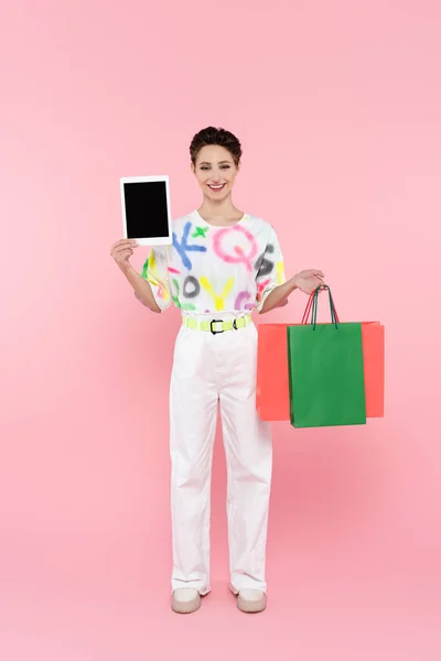 Full Length View Happy Woman Holding Shopping Bags Digital Tablet — Fotografia de Stock