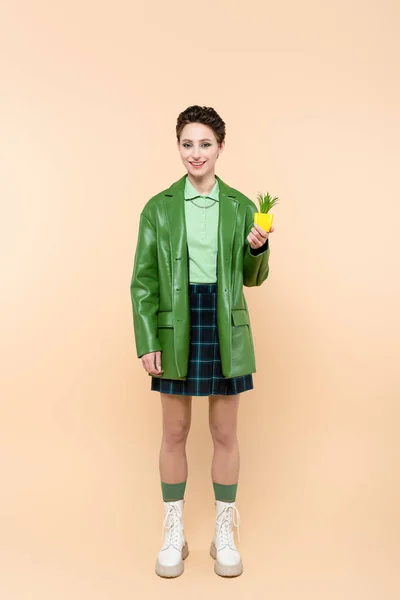 Full Length View Happy Woman Green Jacket White Boots Holding — Stock Photo, Image