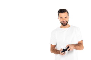 KYIV, UKRAINE - 5 Aralık 2021: tişörtlü, joystick 'li neşeli adam beyaz üzerine izole edildi