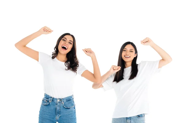 Excited Interracial Women Showing Rejoice Gesture While Looking Camera Isolated — Stock Photo, Image
