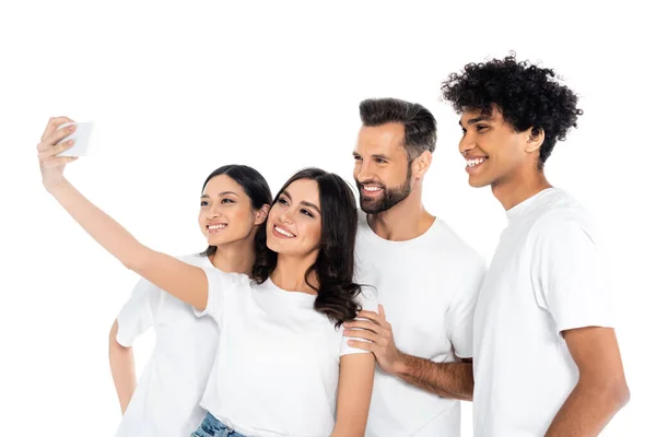 Mujer Complacida Tomando Selfie Con Amigos Interracial Teléfono Móvil Aislado — Foto de Stock