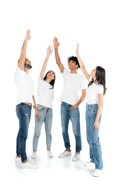 Full Length View Cheerful Multicultural Friends Standing Raised Hands While — Fotografie, imagine de stoc