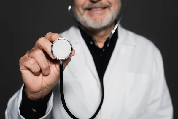 Cropped View Blurred Smiling Physician Holding Stethoscope Isolated Black — Foto de Stock
