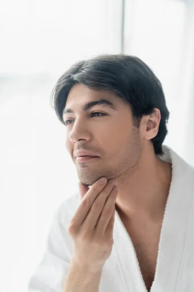 Young Brunette Man Smiling While Touching Face Bathroom — Stock Photo, Image