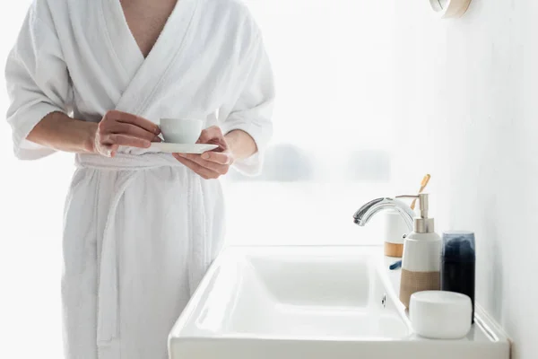 Cropped View Man White Bathrobe Holding Coffee Cup Sink Containers — Stock Photo, Image