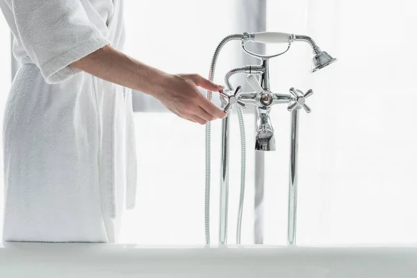 Partial View Man White Bathrobe Opening Faucet Bathtub — Stock Photo, Image