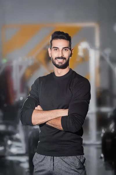 Young Arabian Sportsman Smiling Camera Blurred Gym — Stock Photo, Image