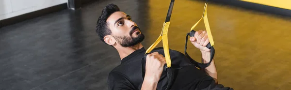Bearded Arabian Man Working Out Suspension Straps Sports Center Banner — Stock Photo, Image