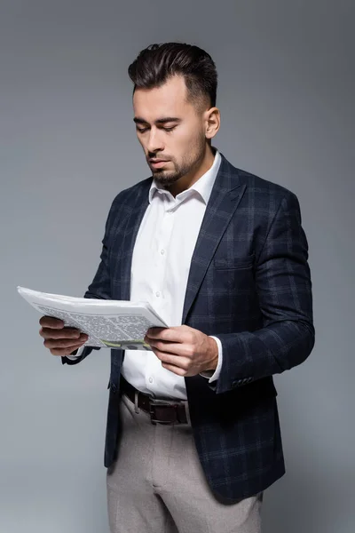 Young Bearded Businessman Checkered Blazer Reading Newspaper Isolated Grey — Stock Photo, Image