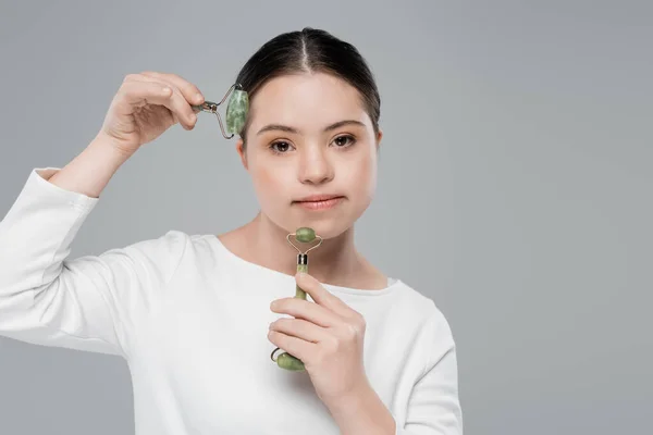 Young Woman Syndrome Using Jade Rollers Isolated Grey — Stock Photo, Image