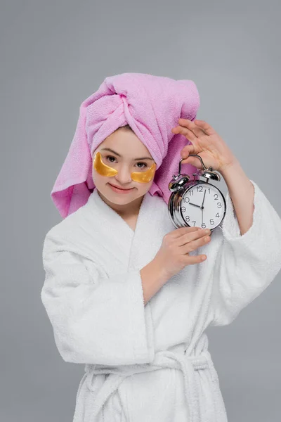 Woman Syndrome Eye Patches Bathrobe Holding Alarm Clock Isolated Grey — Stock Photo, Image