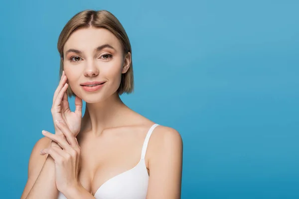 Vrolijk Jong Vrouw Wit Beha Glimlachen Geïsoleerd Blauw — Stockfoto