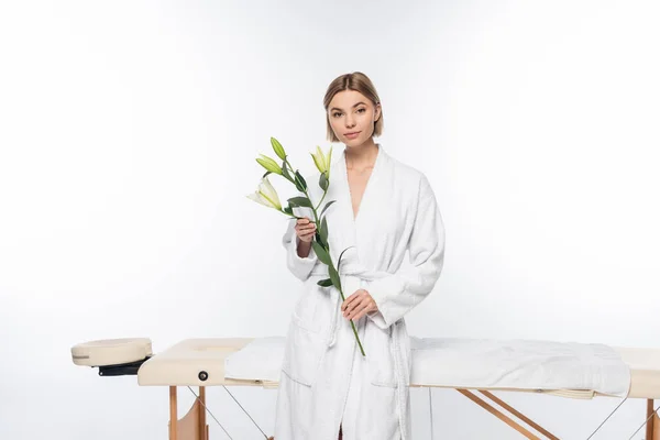 Young Blonde Woman Holding Flowers Massage Table White — Stock Photo, Image