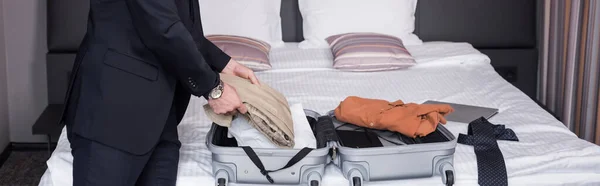 Cropped View Man Suit Unpacking Suitcase Hotel Room Banner — Stock Photo, Image