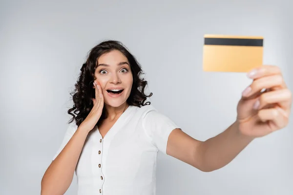 Excited Woman Holding Credit Card Cashback Isolated Grey — Stock Photo, Image