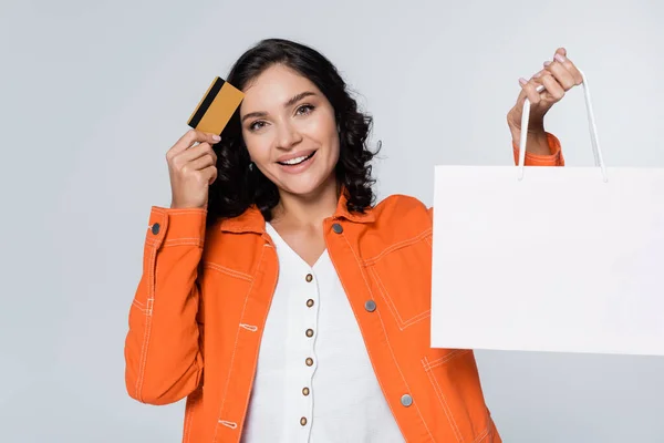 Joyful Young Woman Orange Jacket Holding Credit Card Cashback Shopping — Stock Photo, Image