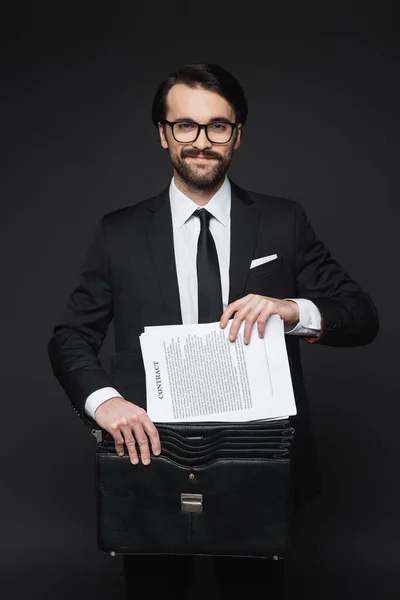 Cheerful Businessman Mustache Glasses Putting Contract Leather Briefcase Dark Grey — Stock Photo, Image