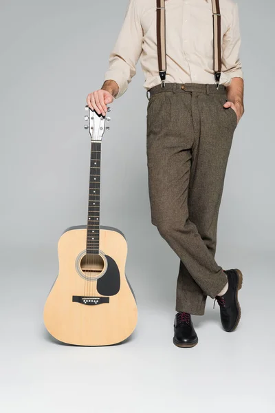 Cropped View Man Standing Hand Pocket Acoustic Guitar Grey — Stock Photo, Image