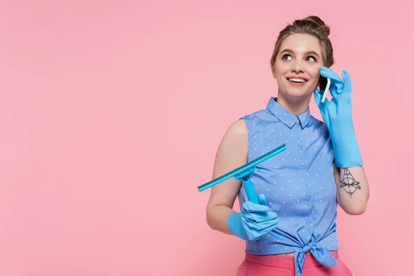 Cheerful Young Woman Rubber Gloves Holding Window Wiper Talking Smartphone — Stock Photo, Image
