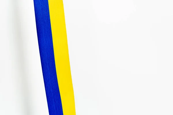 Top View Blue Yellow Ribbon Shadow White Background — Stock Photo, Image