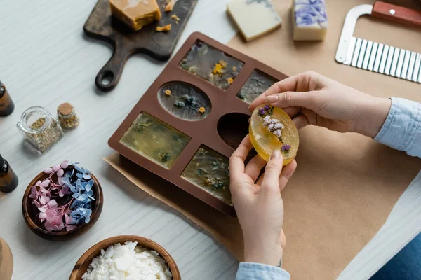 Top View Craftswoman Holding Handmade Soap Silicone Mold Supplies Table — Stock Photo, Image