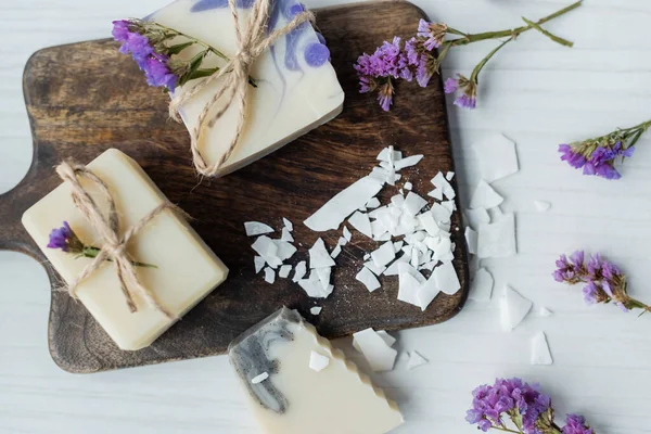 Top View Homemade Soap Flakes Cutting Board Flowers Table — Stock Photo, Image