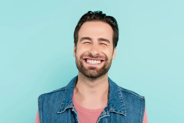 Happy Young Man Closing Eyes Isolated Blue — Stock Photo, Image