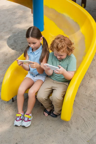 High Angle View Kids Using Smartphones While Sitting Slide — Stock Photo, Image