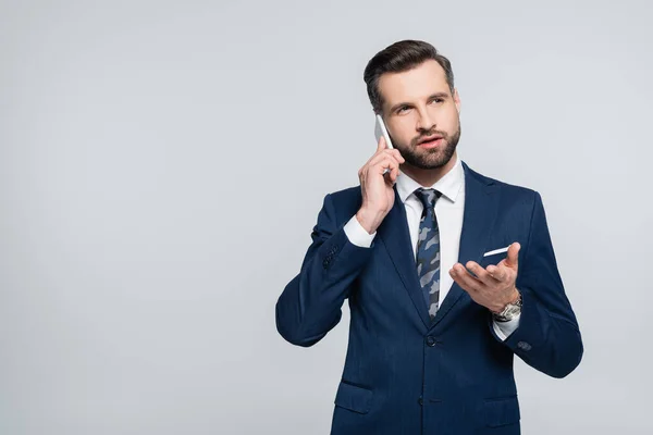Economist Blue Suit Pointing Hand While Talking Smartphone Isolated Grey — Stock Photo, Image