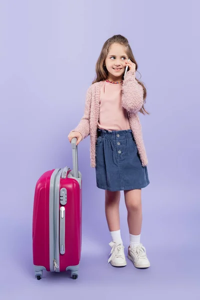 Full Length Happy Girl Talking Smartphone Pink Baggage Purple — Stock Photo, Image