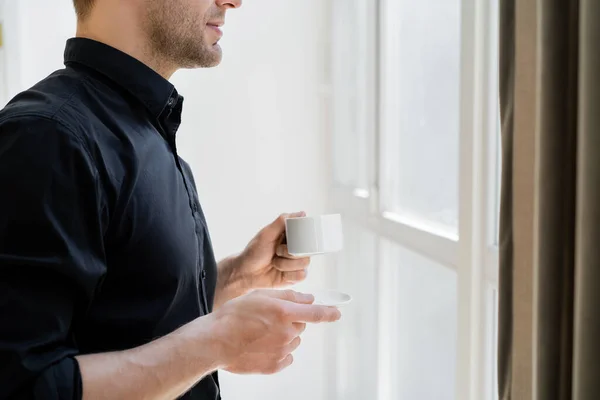 Side View Cropped Man Black Shirt Holding Saucer Coffee Cup — Stock Photo, Image