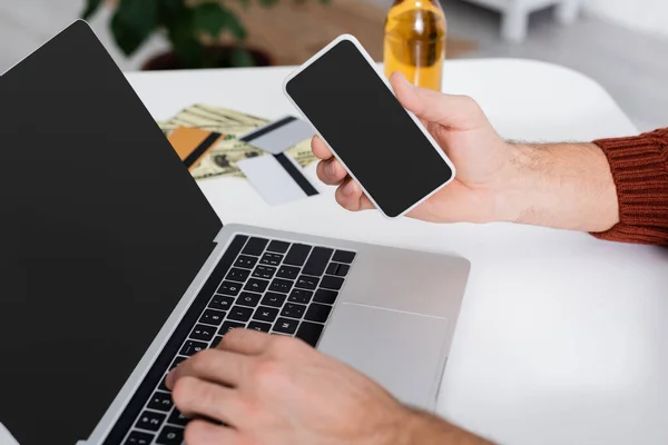 Partial View Bookmaker Smartphone Laptop Blank Screen Blurred Credit Cards — Stockfoto