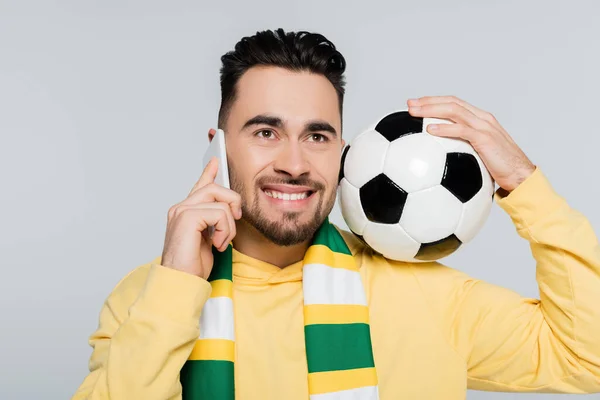 Cheerful Football Fan Striped Scarf Talking Mobile Phone Isolated Grey — Stock Photo, Image