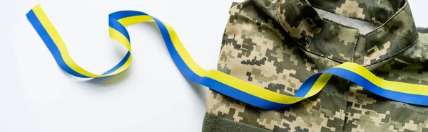 Top View Military Uniform Blue Yellow Ribbon White Background Banner — Stock Photo, Image