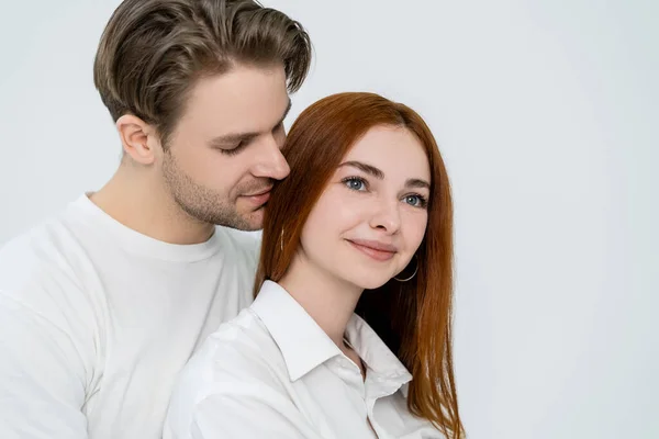 Young Man Kissing Smiling Red Haired Girlfriend Isolated White — Stock Photo, Image