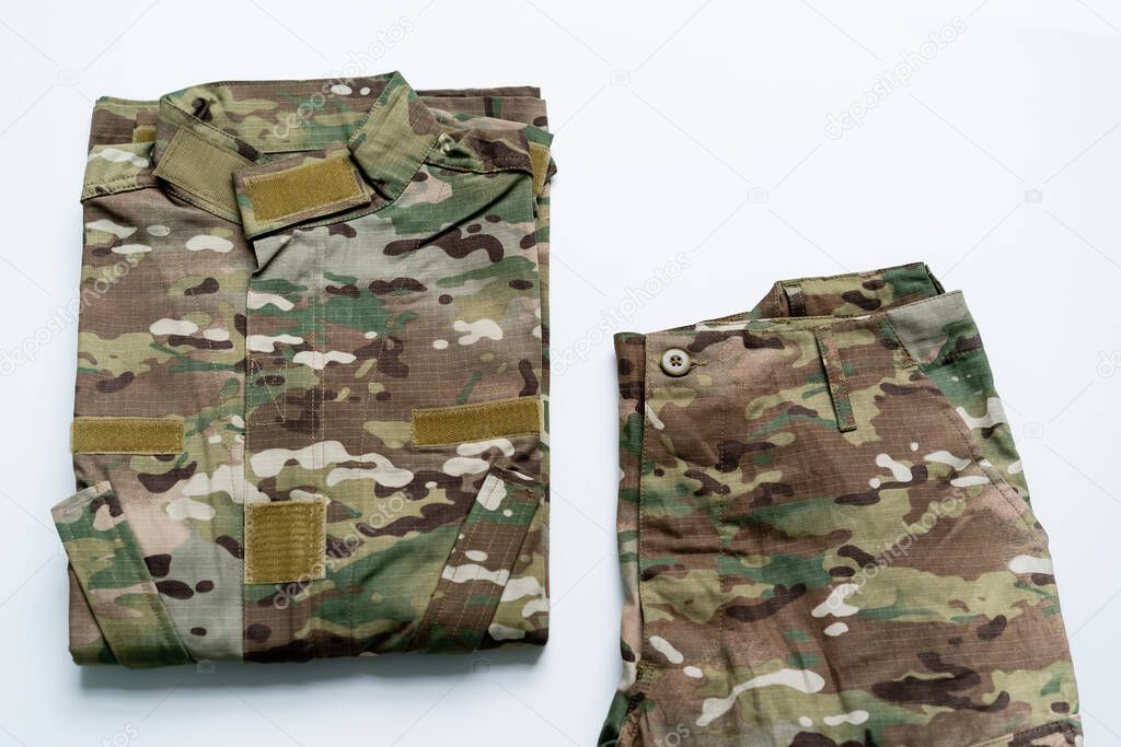 Top view of military uniform on white background