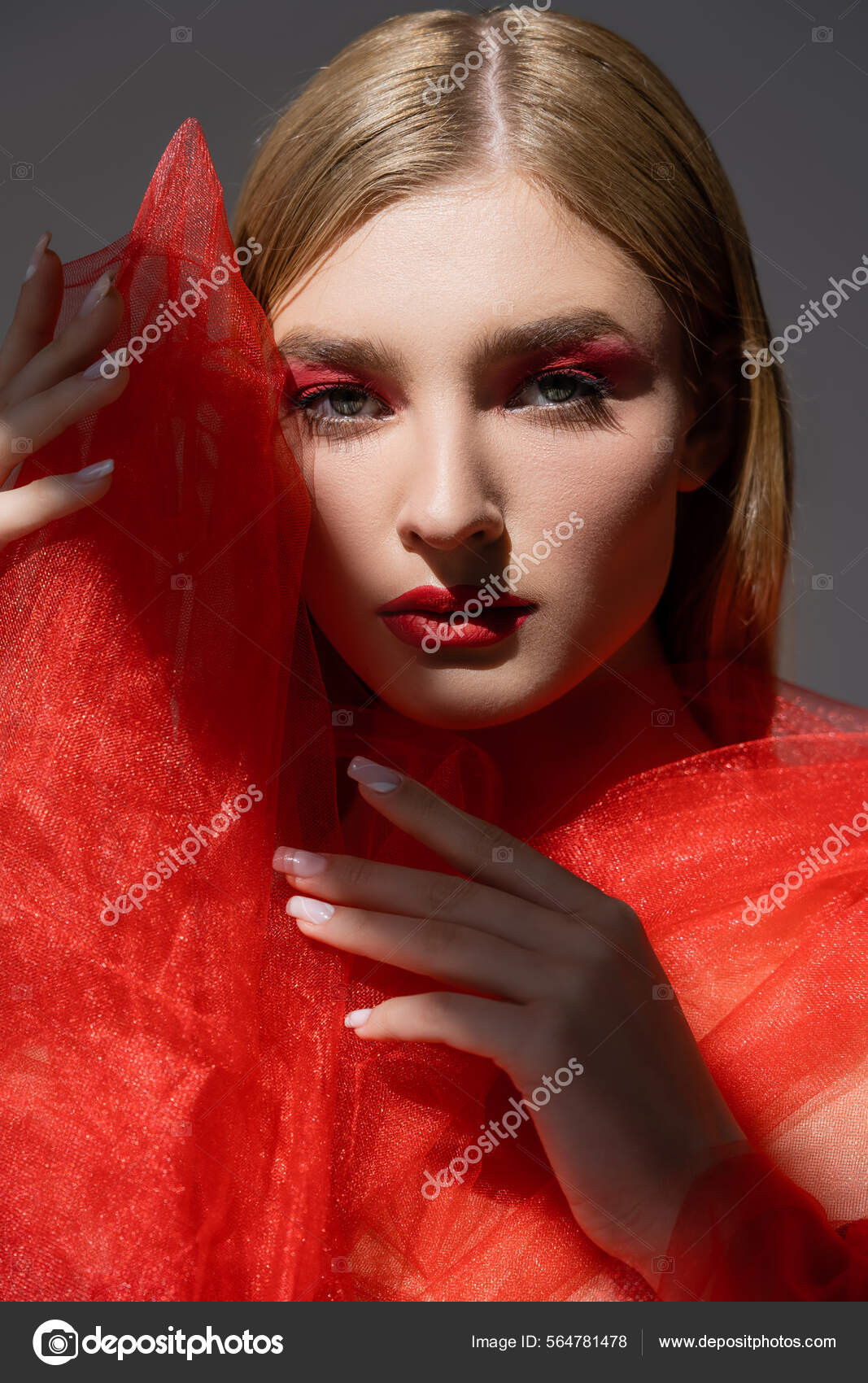 bela jovem. menina elegante em uma faixa vermelha de tintas