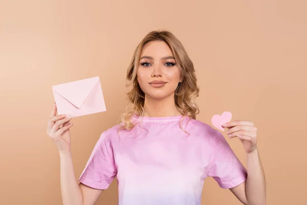 Happy Woman Wavy Hair Holding Envelope Paper Heart Isolated Beige — Stockfoto