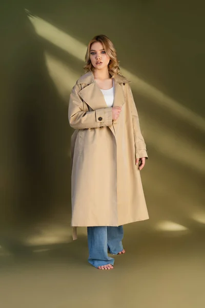 Full Length Young Barefoot Woman Oversize Trench Coat Beige Background — Foto de Stock