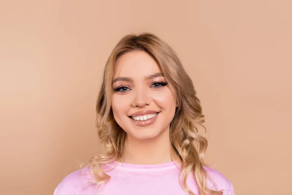 Young Woman Wavy Hair Smiling Camera Isolated Beige — Stock Photo, Image