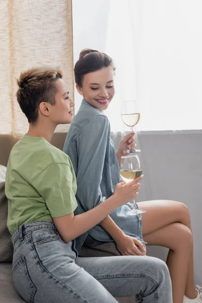 Young Pangender Couple Glasses White Wine Smiling Home — Foto de Stock